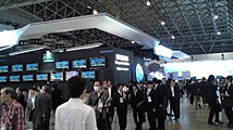 Visitors at the Mitsubishi Electric booth