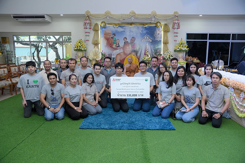 photo: Donation to Wat Phrabat Nampu, which cares for AIDS patients