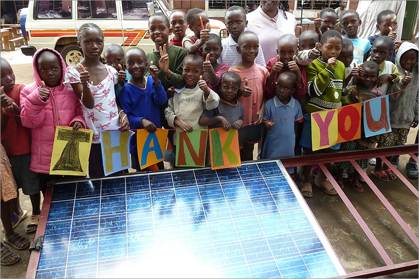 photo: Children and Solar panels installed at the Brainhouse Academy