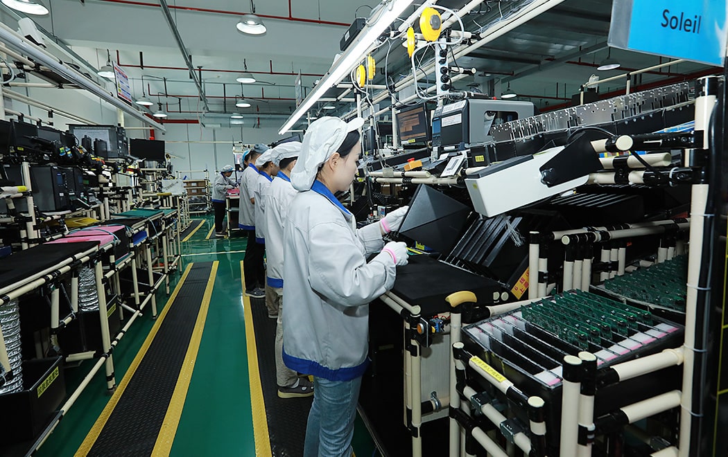 Router production line at the Suzhou plant. 58 models are assembled on ten mixed-flow lines.