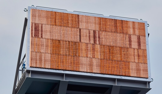 Prototype of resin-injection-molded waveguide array antenna